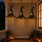 Three glowing witch hat cascade lights hanging on a porch
