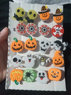 Pumpkin and ghost rings up close