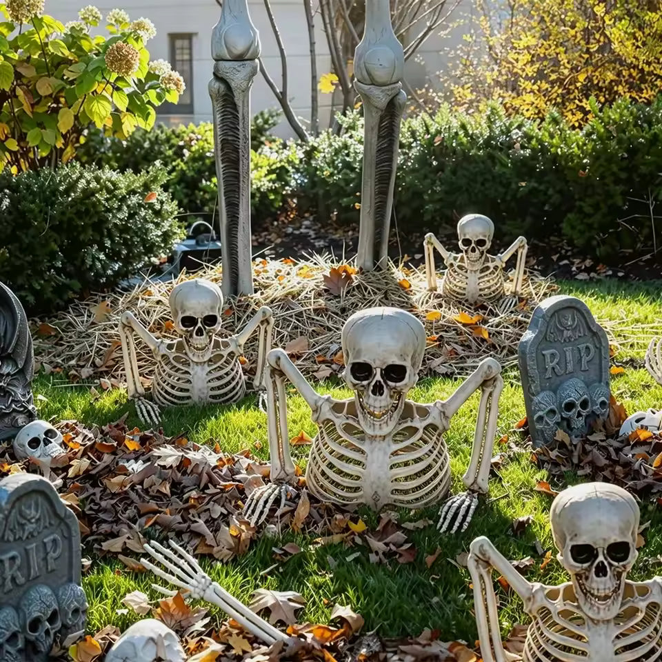 Skull and ribcage ground breaker with skeleton arms in the yard