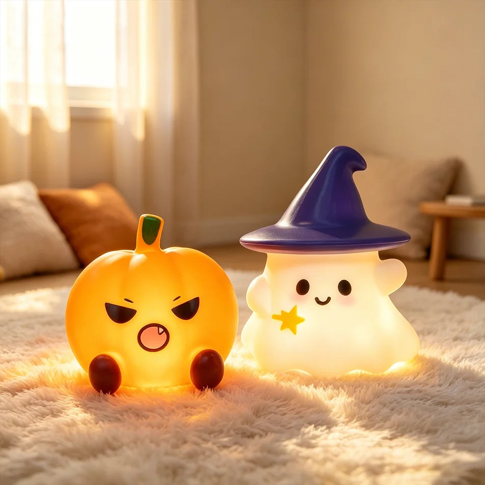 The ghost and pumpkin pair side by side