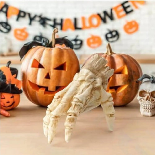 Crawling hand on a Halloween party table