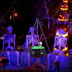 Tripod cauldron glowing in a purple-lit yard