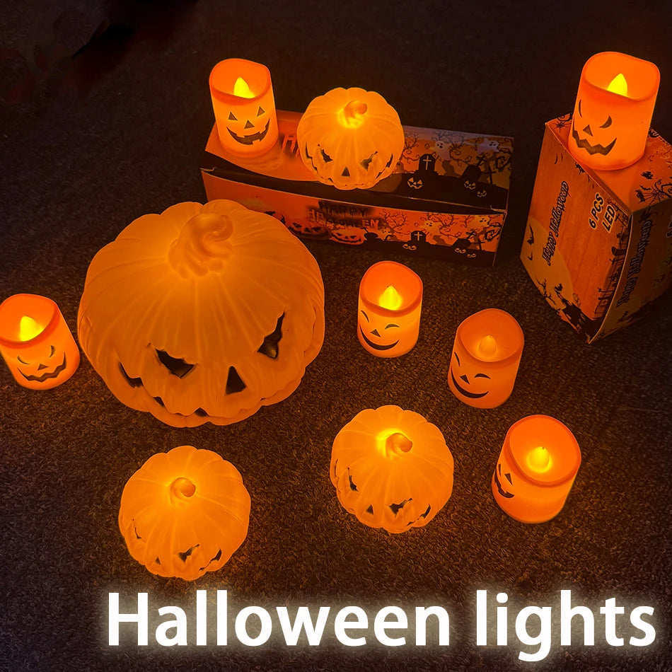 Glowing jack-o'-lantern lights on a dark table